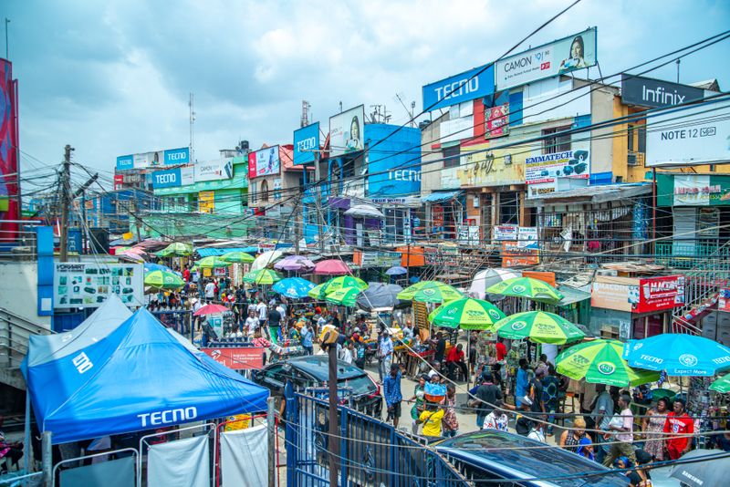 Bustling open-air wholesale trading market in Lagos, Nigeria